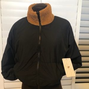 BLACK Fabletics Reversible Jacket- fits thru size 7-8
